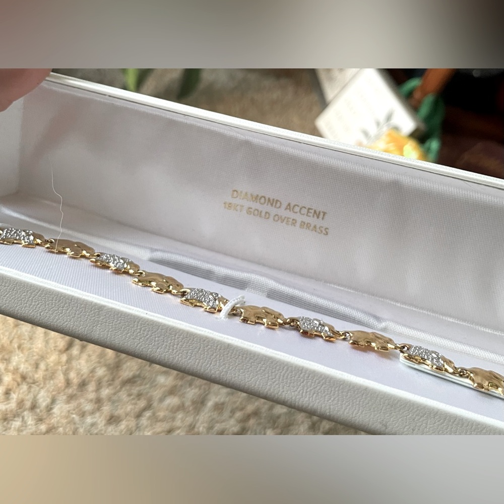 Brand new with tags 18kt Gold over Brass Diamond accent Elephant bracelet!